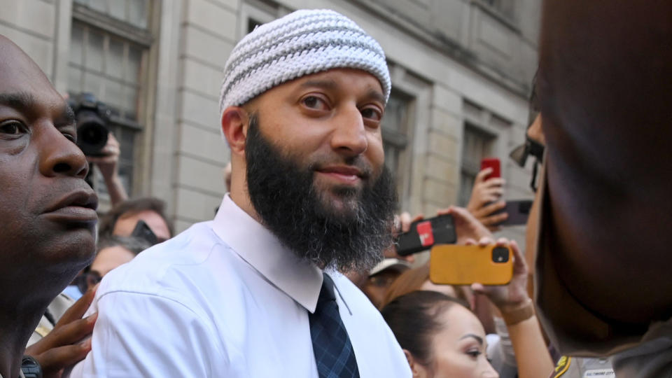 Adnan Syed surrounded by reporters after being released from prison