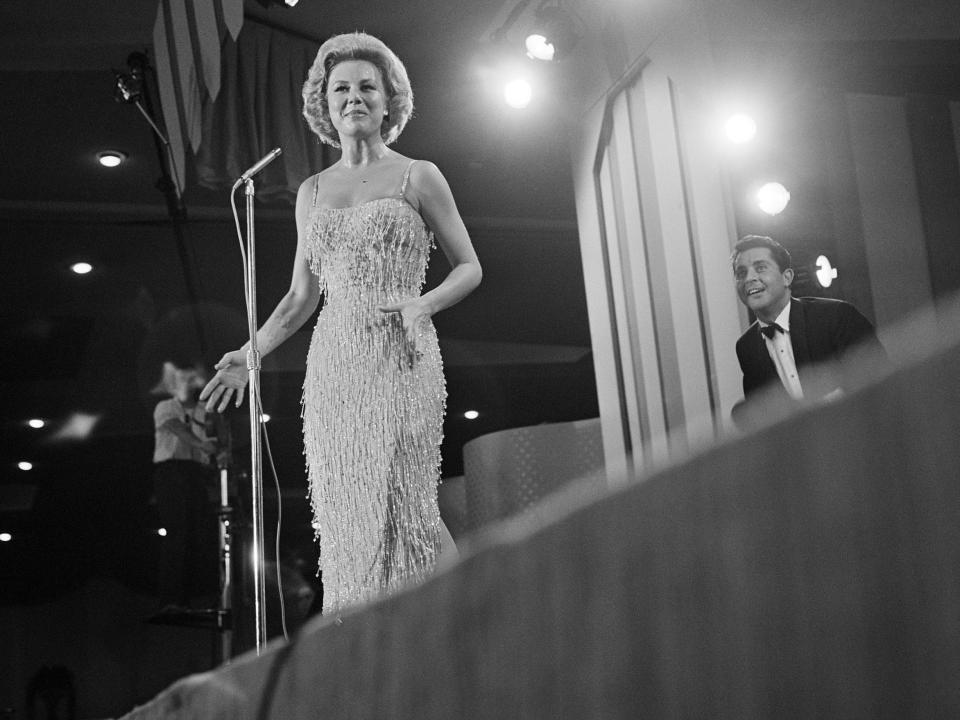 Mitzi Gaynor performing on the Ed Sullivan Show at the Deauville Hotel in 1964.