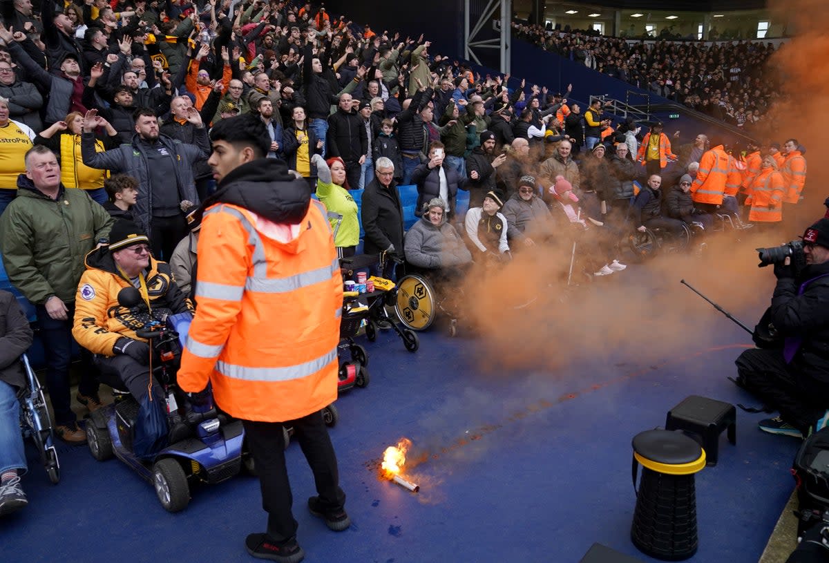 A smoke flare on the ground in front of the Wolverhampton Wanderers during the Emirates FA Cup fourth round match at The Hawthorns (Bradley Collyer/PA Wire)