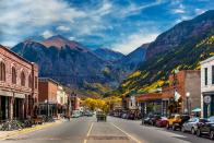 Telluride was founded in 1878 as a prosperous mining town, and its original two- and three-story flat roof structures still line many streets—namely the main street, dubbed Colorado Avenue, where the city’s most famous landmark still stands. The New Sheridan Hotel, constructed in 1895 at 231 West Colorado Avenue, became an instant hot spot among the newcomers—mostly gold-hungry tycoons—and remained at the heart of the Telluride social scene.