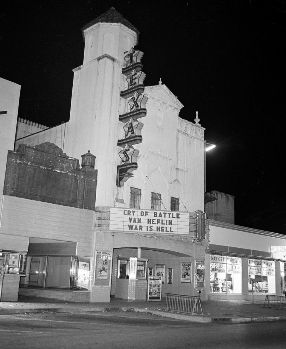 This Nov. 22, 1963 file photo shows the movie theater where Lee Harvey Oswald was arrested after U.S. President John F. Kennedy was shot and killed in Dallas. (AP Photo/File)