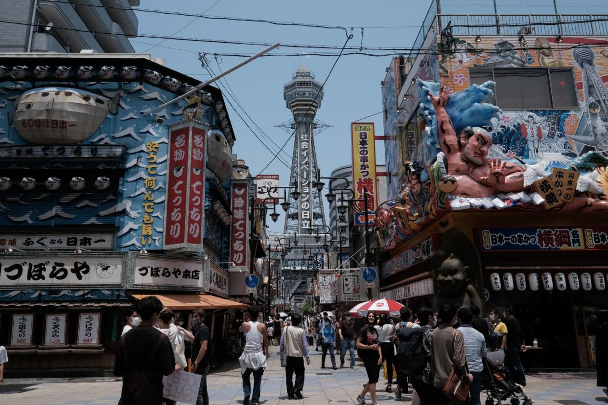 The Tsutenkaku tower, center, in the Shinsekai neighborhood in Osaka, Japan, on Sunday, June 19, 2022. (Soichiro Koriyama/Bloomberg)