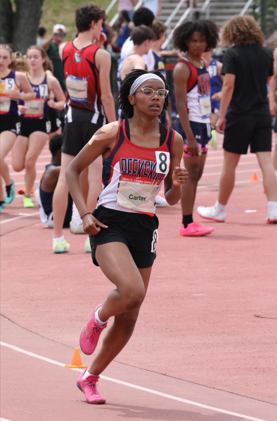 Brianna Carter from Peekskill competes in the Women's Section One mile during the 55th annual Glenn D. Loucks Track & Field Games at White Plains High School, May 13, 2023. 