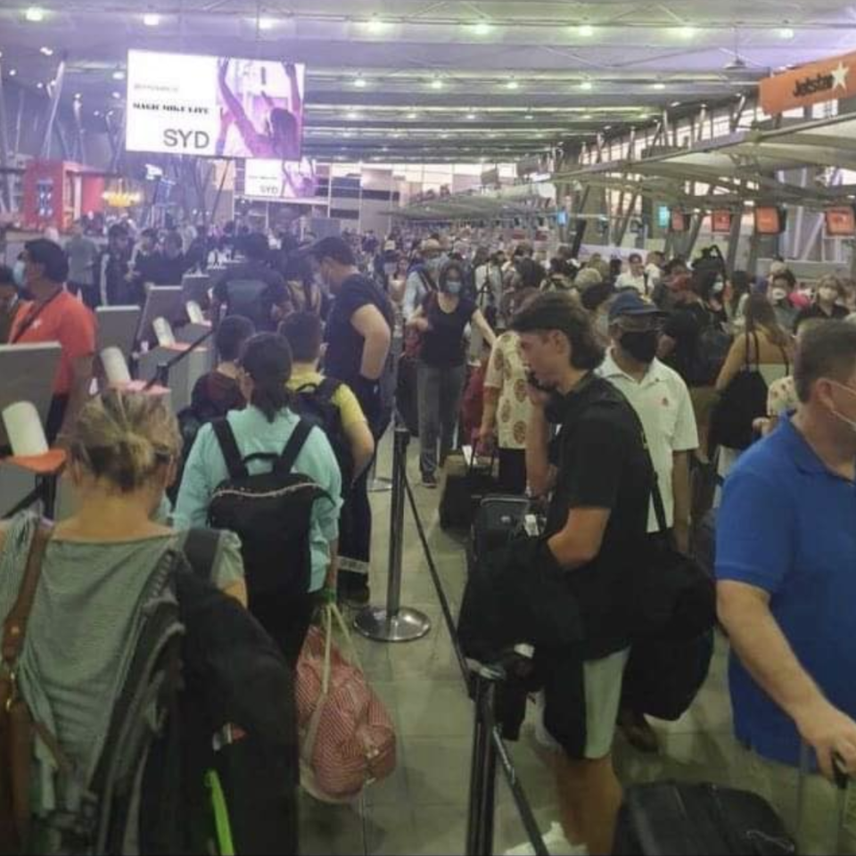 Chaos at Sydney Airport as huge crowds queue and fail to social distance. 