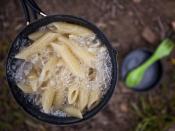 <p>Prevent extra cooked pasta from hardening by stashing it in a sealed plastic bag and refrigerating. When you're ready to serve, throw the pasta in boiling water for a few seconds to heat and restore moisture.</p>