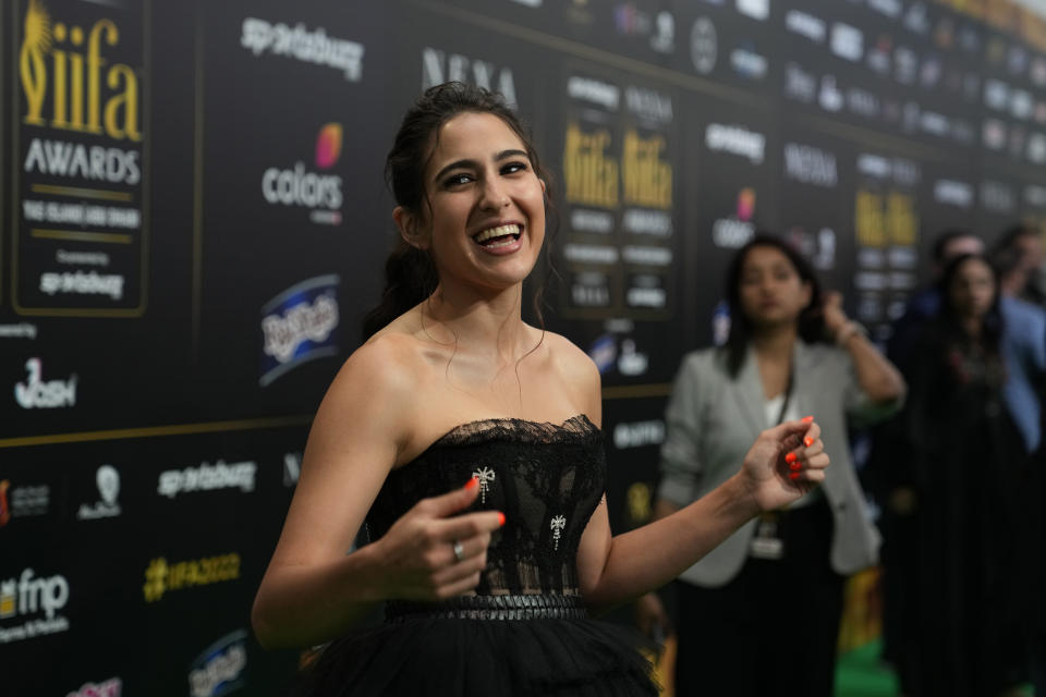 Indian actress Sara Ali Khan poses on the green carpet ahead of the 22nd International Indian Film Academy (IIFA) awards in Abu Dhabi, United Arab Emirates, Friday, June 3, 2021. (AP Photo/Kamran Jebreili)