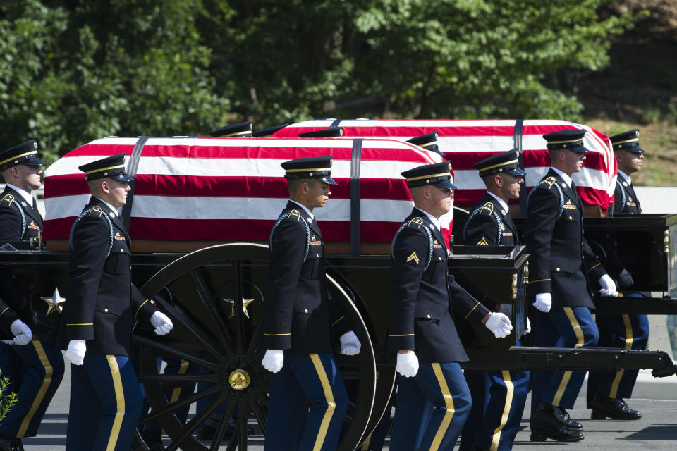 The 3rd Infantry Regiment, also known as the Old Guard, Caisson Platoon carry the remains of two unknown Civil War Union soldiers to their grave at Arlington National Cemetery in Arlington, Va.,Thursday, Sept. 6, 2018. The soldiers were discovered at Manassas National Battlefield and will be buried in Section 81. Arlington National Cemetery opened the new section of gravesites with the burial. (AP Photo/Cliff Owen)