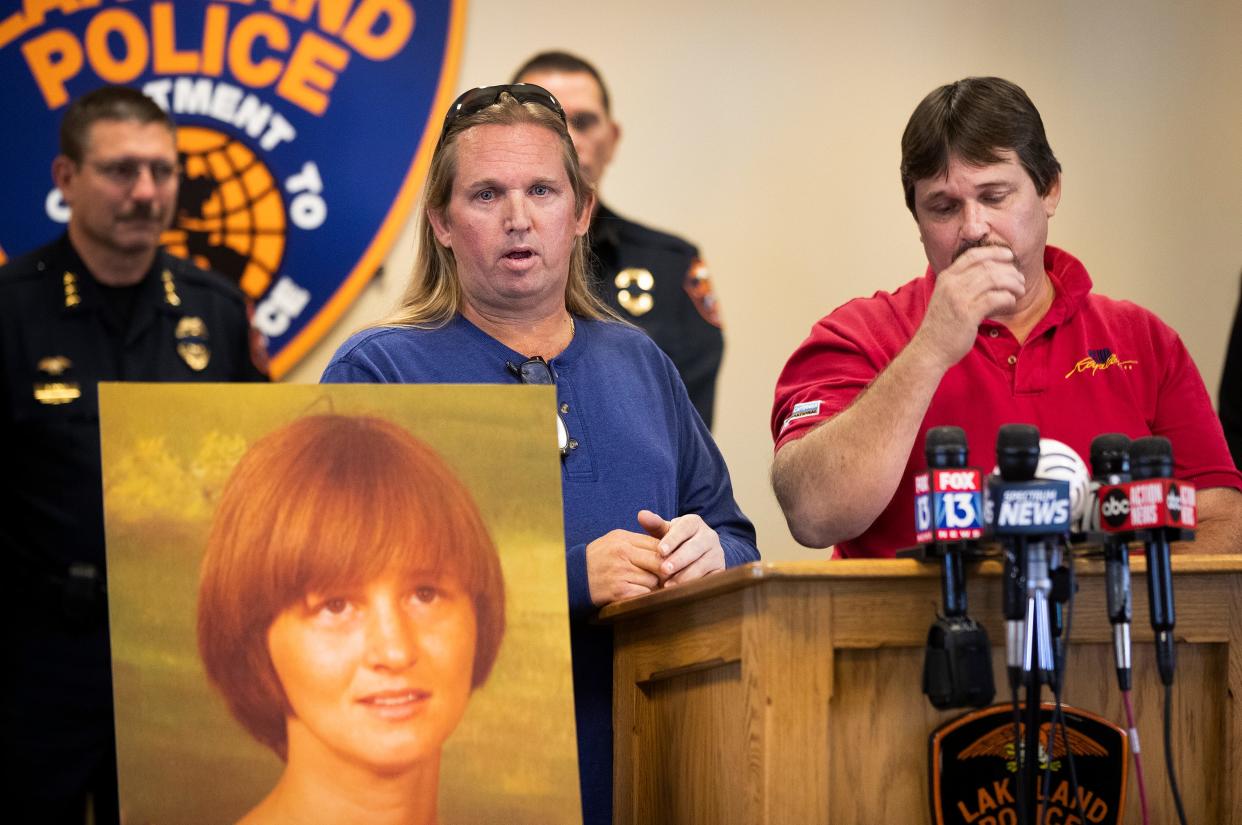 Tim Slaten, left, and his brother, Jeff Slaten, stand next to a portrait of their mother as they answer questions regarding the arrest of a suspect in the cold case murder of Linda Slaten during a media briefing at Lakeland Police Department on Dec. 19, 2019. Slaten was murdered in 1981. The man suspected of her sexual battery and murder, Joseph Clinton Mills, 58, of Lakeland, was arrested Dec. 12. The Slaten case is Polk County's last cold case murder in which an arrest was made.