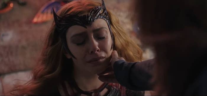 Wanda touching another version of her, dressed as the Scarlet Witch, in "Doctor Strange in the Multiverse of Madness"