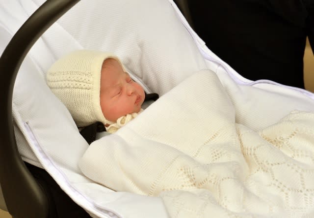 Welcome to the world, little princess! On Saturday evening, Prince William and Kate Middleton presented the newest addition to their family: The Princess of Cambridge. The Duchess of Cambridge arrived at the hospital in labor at 6 a.m. local time and gave birth at 8:34 a.m. to a baby girl weighing 8 lbs, 3 oz. <strong>PICS: See More First Pics of the New Princess!</strong> By 6:11 p.m. local time, the proud parents exited the Lindo Wing of St. Mary's hospital with their new tiny bundle of joy. Getty Images Getty Images Getty Images <strong> NEWS: Prince William and Kate Middleton Welcome Baby Girl</strong> This being Kate Middleton, after all, you better believe her hair was on point and she looked just as flawless as ever. Getty Images The duchess wore a custom Jenny Packham yellow and white dress. Her daughter was wrapped in a white crochet blanket. <strong> PICS: Prince George Visits His New Little Sister!</strong> The proud parents waved for a couple of moments before going back into the hospital. "Their Royal Highnesses would like to thank all staff at the hospital for the care and treatment they have all received," Kensington Palace announced on Twitter. "They would also like to thank everyone for their warm wishes." <strong>PHOTOS: Prince William & Kate Middleton: A Very Royal Family Album</strong> Their Royal Highnesses would like to thank all staff at the hospital for the care and treatment they have all received.— Kensington Palace (@KensingtonRoyal) May 2, 2015 They would also like to thank everyone for their warm wishes.— Kensington Palace (@KensingtonRoyal) May 2, 2015 The palace also tweeted out these adorable photos of the new baby princess. #WelcomeToTheFamily pic.twitter.com/tTJD4wU5QY— Kensington Palace (@KensingtonRoyal) May 2, 2015 Her name has not been announced yet, but the little lady is the first princess born to a royal family since Princess Anne was born in 1950. <strong>PICS: Kate Middleton's Impeccable Maternity Style</strong> After her birth, Prince William went to fetch Prince George to come and meet his little sister. The little prince then returned to the palace after his visit. Following the the princess' debut, Will and Kate packed up their baby girl in a car seat and returned to Kensington Palace. From entering the hospital to checking out, the whole process only took 12 hours. That must be some new royal record? ETONLINE For more details about the royal baby, watch the video below: