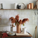 <p>Dried florals are no longer the outdated displays at Grandma's house. They are trending in a decidedly modern fashion, as seen in this <a href="https://go.redirectingat.com?id=74968X1596630&url=https%3A%2F%2Fbloomist.com%2F&sref=https%3A%2F%2Fwww.veranda.com%2Fluxury-lifestyle%2Fentertaining%2Fg33567880%2Fthanksgiving-centerpieces%2F" rel="nofollow noopener" target="_blank" data-ylk="slk:Bloomist;elm:context_link;itc:0;sec:content-canvas" class="link ">Bloomist</a> display. Forget the real flowers that will last just couple days; dried florals will make it through the season and have a beautiful muted fall palette. (Styled by Ayesha Patel.)</p>