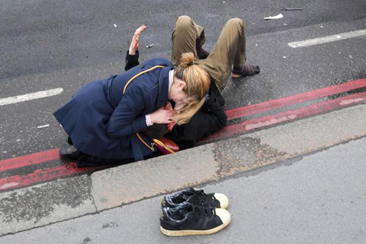 Westminster attack: Cara Lockwood tends to her injured husband Stephen: REUTERS