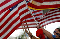 <p>Activists wave flags during the Mother of All Rallies demonstration promoting on the National Mall in Washington, Sept. 16, 2017. (Photo: Aaron P. Bernstein/Reuters) </p>