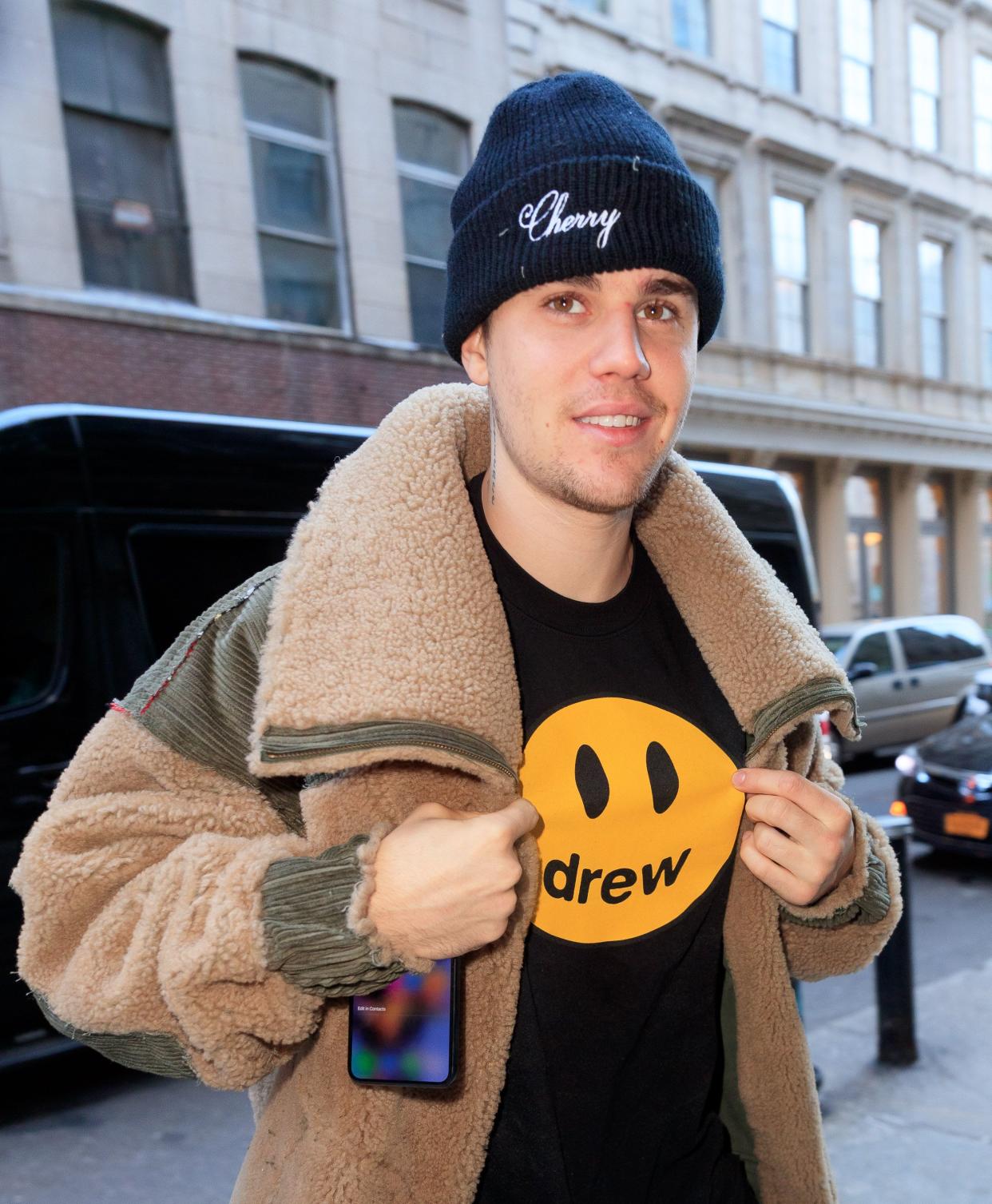 Justin Bieber takes to the streets in casual outfit and is captured on camera looking dashing