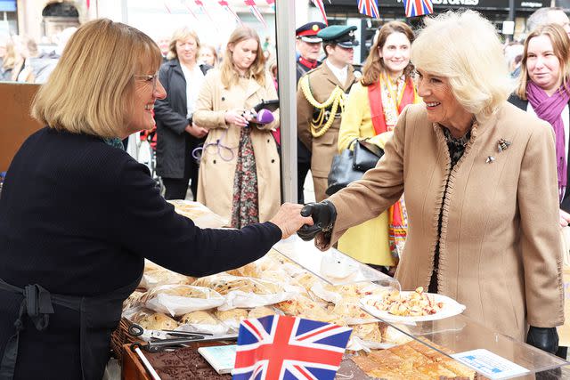 <p>Chris Jackson/Pool/Getty</p> Queen Camilla visits the Shrewsbury Farmers' Market on March 27, 2024
