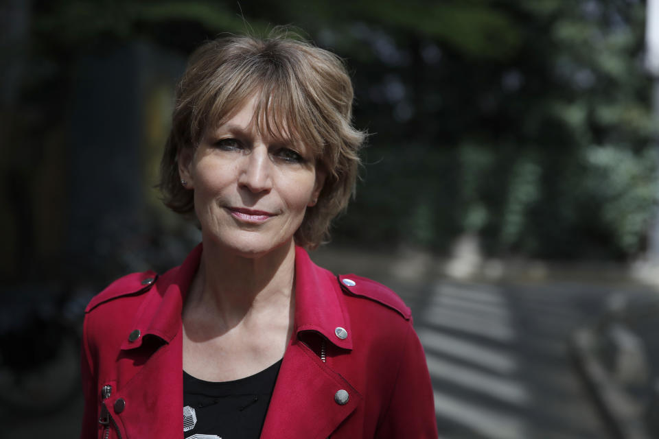 Amnesty International Secretary General Agnes Callamard poses in Paris, Tuesday, April 6, 2021. Agnes Callamard is best known for her investigation into the killing of Saudi journalist Jamal Khashoggi, and has made a career uncovering extra-judicial killings. The French human rights expert's focus on rights abuses is taking on new dimensions as she assumes leadership of Amnesty International and turns her attention to what she says is one of the world's most pressing rights issues — vaccine equity. (AP Photo/Christophe Ena)