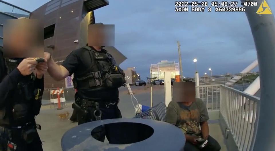 Tempe police body camera video shows officers speaking to Sean Bickings moments before he jumped into an Arizona lake and drowned.