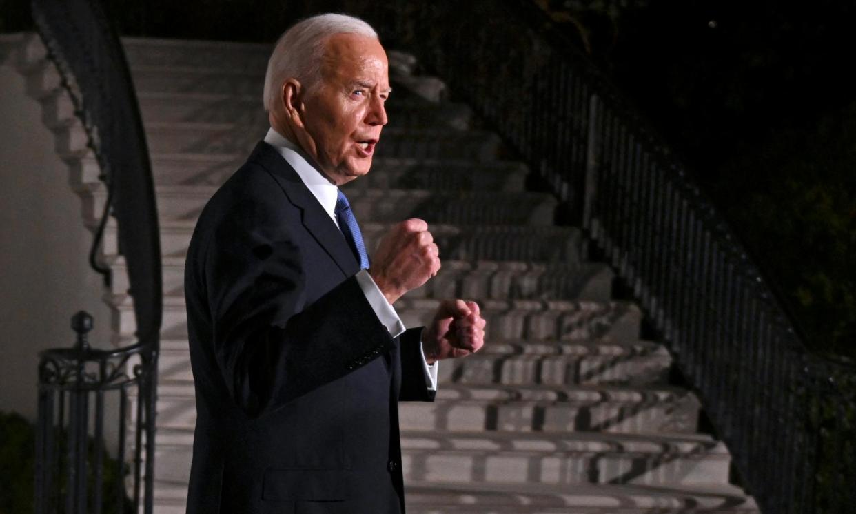<span>Joe Biden gestures as he departs the White House to deliver the State of the Union address in Washington DC, on 7 March. </span><span>Photograph: Roberto Schmidt/AFP/Getty Images</span>