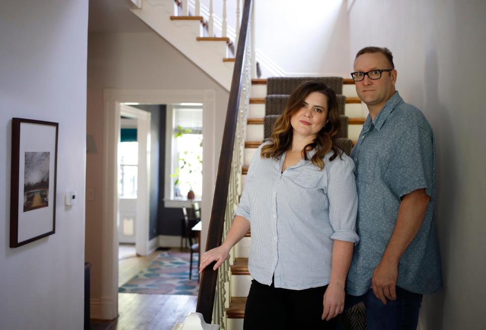 Meaghan Thomas and her partner Thomas McGee stand for a portrait at their home on Monday, May 9, 2022 in Louisville. The couple owns Pinch Spice Market.