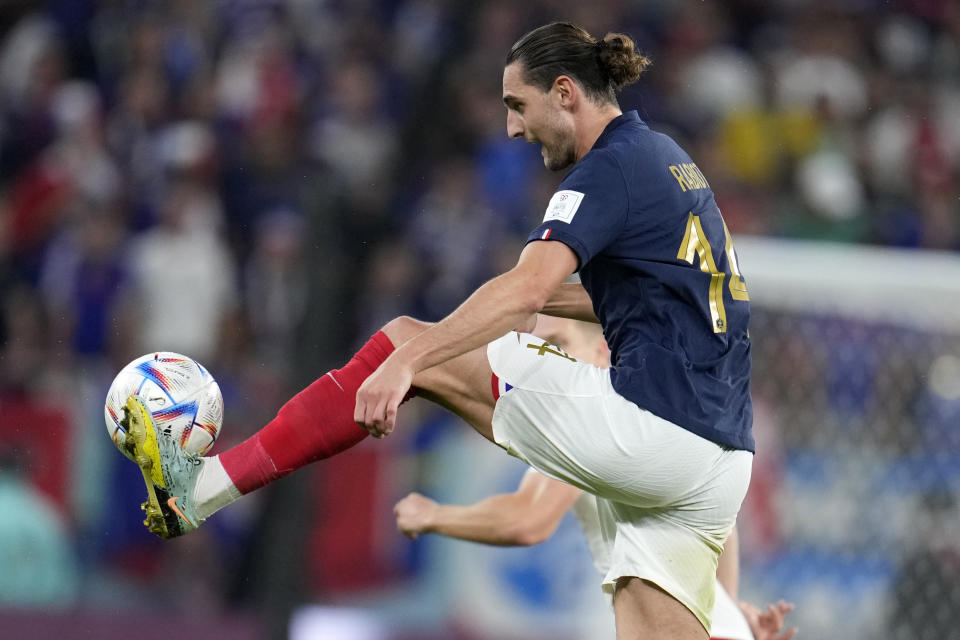 France's Adrien Rabiot controls the ball during the World Cup round of 16 soccer match between France and Poland, at the Al Thumama Stadium in Doha, Qatar, Sunday, Dec. 4, 2022. (AP Photo/Natacha Pisarenko)