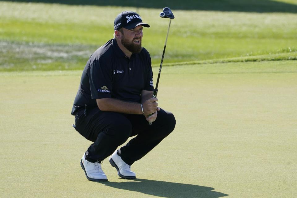 Shane Lowry, of Ireland, reacts to his shot on the ninth green during the final round of the Honda Classic golf tournament, Sunday, Feb. 27, 2022, in Palm Beach Gardens, Fla. (AP Photo/Marta Lavandier)