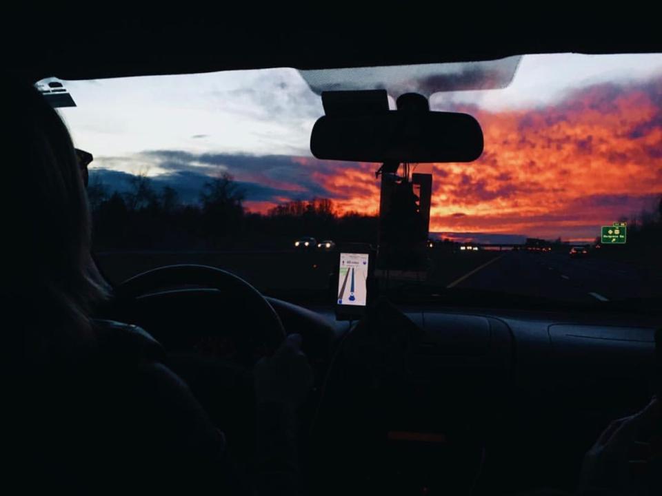 driving in car with sunset in window shield