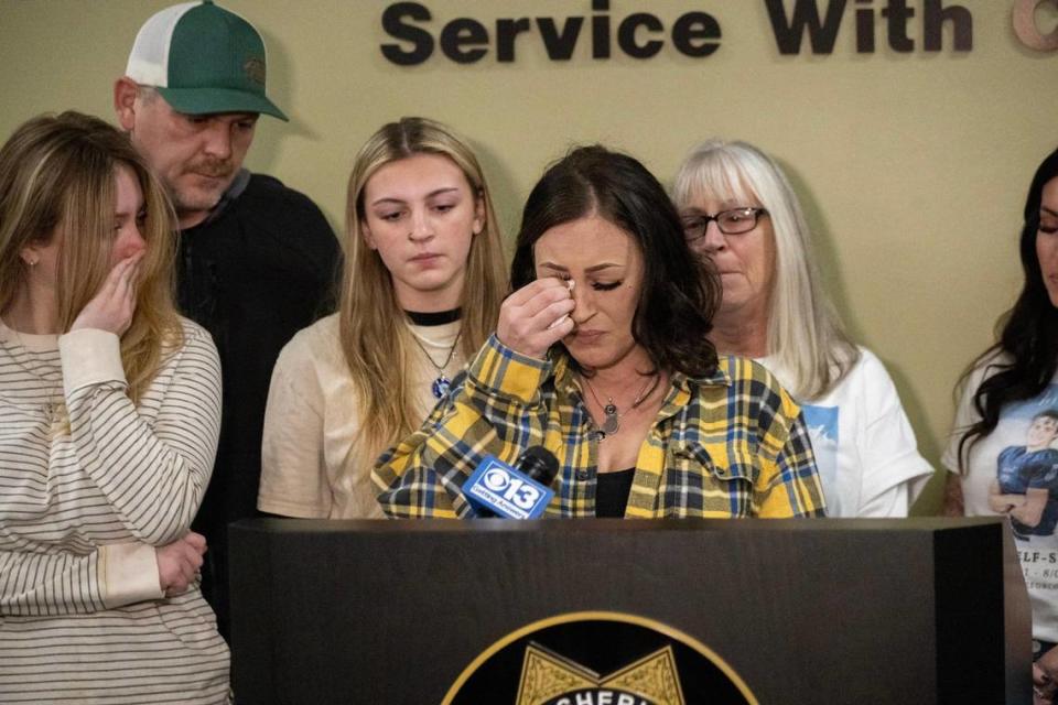 Crystal Shearer, parent of Corey Shearer, wipes tears after a Jan. 6 news conference with family members. Corey Shearer, 20, of Ione was shot and killed Aug. 5, 2022, at a house party in Rancho Cordova. Deputies on Monday announced an arrest was made in Shearer’s death.