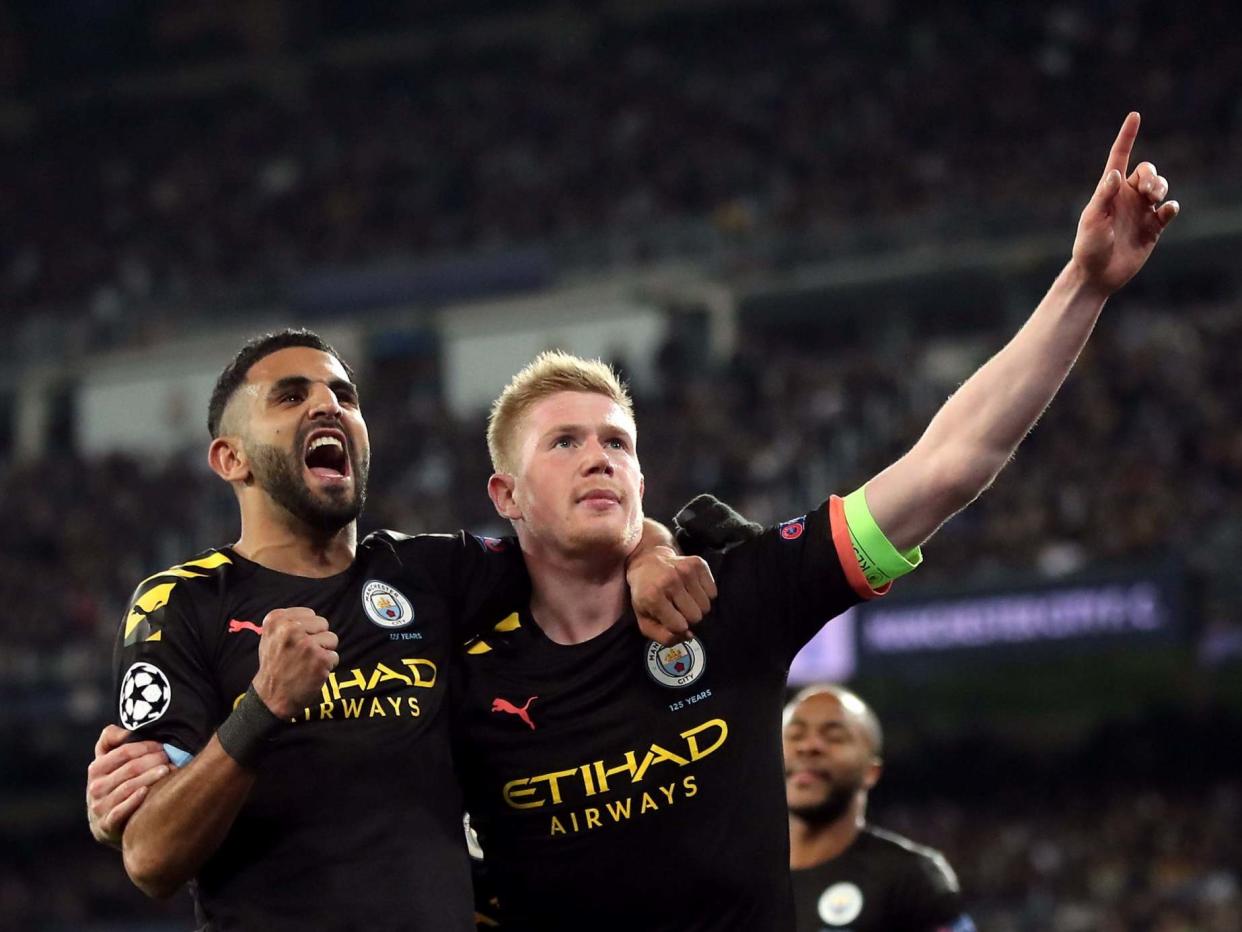 Kevin De Bruyne celebrates with Riyad Mahrez: PA