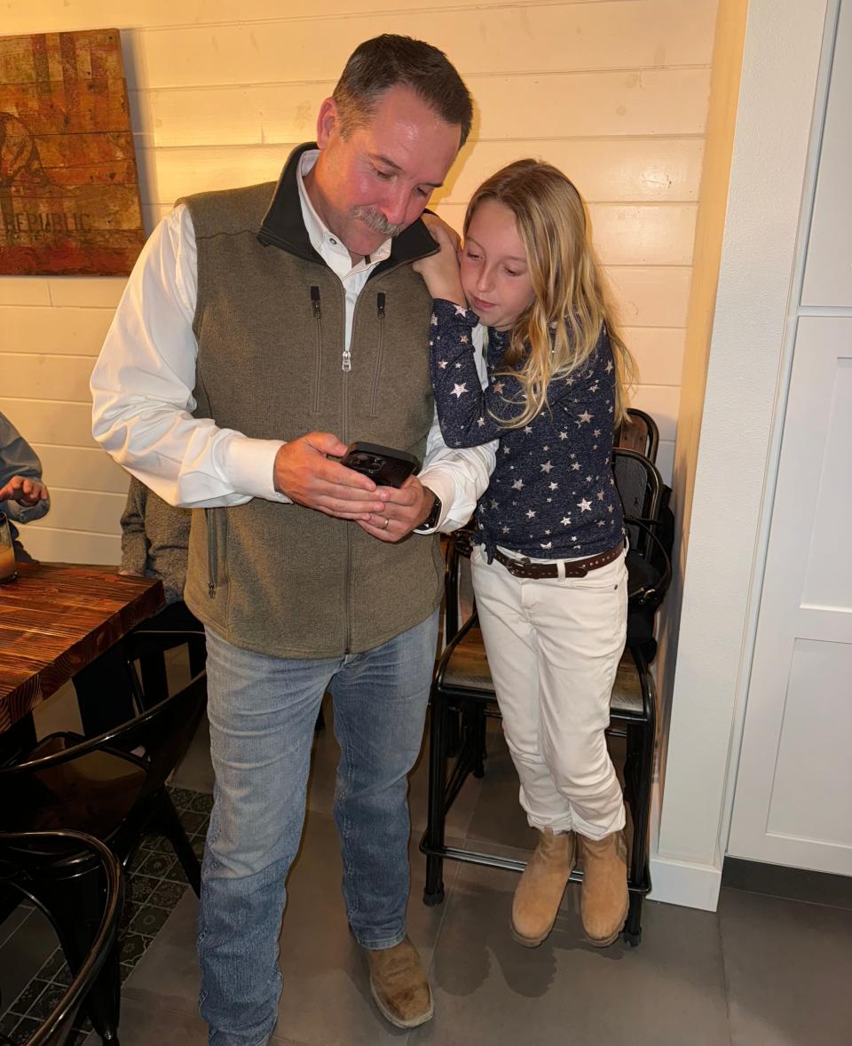 Matt LaVere, Ventura County Supervisor District 1 incumbent, and his daughter Lucia LaVere, age 10, view the election results on Tuesday, March 5, 2024.
