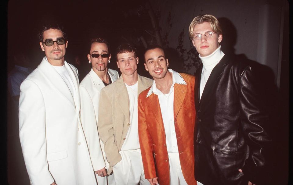 For years, Nick Carter, with Kevin Richardson, far left, AJ McLean, Brian Littrell and Howie Dorough, sported a hairstyle popular in the '90s: hair parted in the middle.