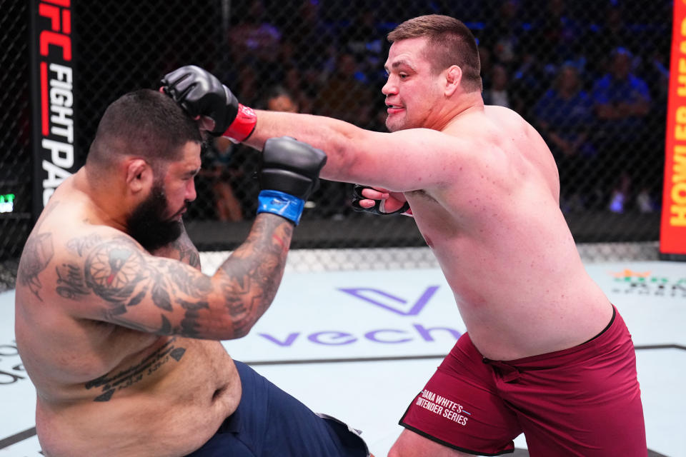 LAS VEGAS, NEVADA – AUGUST 29: (R-L) Thomas Petersen punches Chandler Cole in their heavyweight fight during Dana White’s Contender Series season seven, week four at UFC APEX on August 29, 2023 in Las Vegas, Nevada. (Photo by Chris Unger/Zuffa LLC via Getty Images)