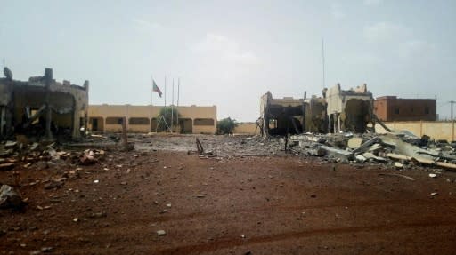 Debris lies scattered in front of the headquarters of the G5 Sahel anti-terror force at Sevare in central Mali, after a sucide bomber tried to get on to the base on June 29