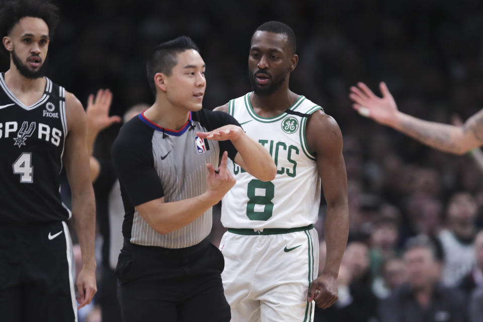 Boston Celtics guard Kemba Walker (8) watches as referee Evan Scott charges him with a technical foul during the third quarter of an NBA basketball game Wednesday, Jan. 8, 2020 in Boston. (AP Photo/Charles Krupa)