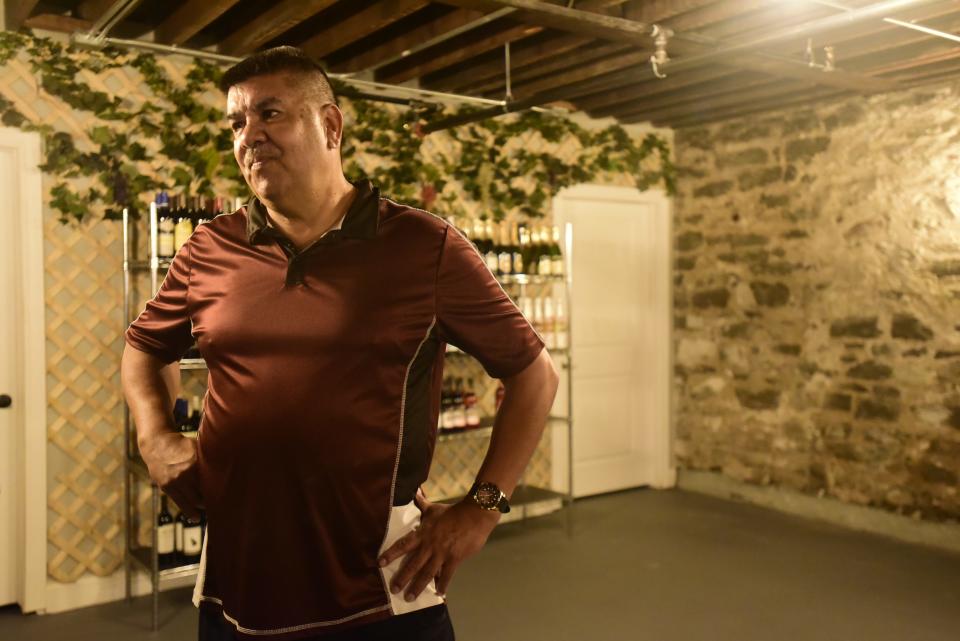 Country Style Market store owner Steve Fernandez tours the new beer and wine cellar in the basement of the Country Style Market in downtown Port Huron on Monday, July 18, 2022.