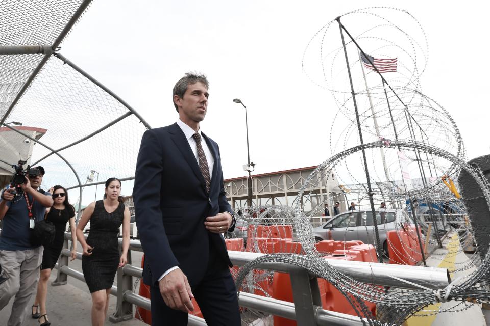 Democratic presidential candidate Beto O'Rourke walks on an international bridge to cross into Ciudad Juarez, Mexico, Thursday, Aug. 8, 2019. O’Rourke has crossed the border into Mexico for the funeral of one of the 22 people killed in a mass shooting at a Walmart in El Paso, Texas. (AP Photo/Christian Chavez)