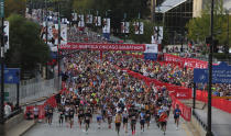 Thousands of runners head north on Columbus Avenue in Grant Park to start the Chicago Marathon on Oct. 8, 2023. (Eileen T. Meslar /Chicago Tribune via AP)