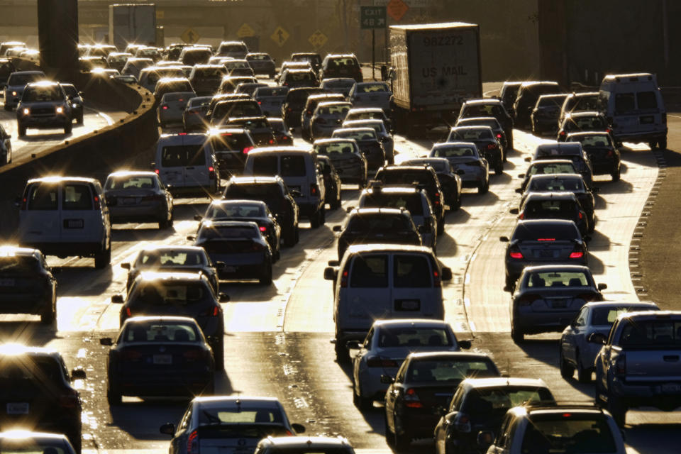 FILE - In this Nov. 15, 2016, file photo morning rush hour traffic moves along the southbound lanes along US 101 near downtown Los Angeles. California's population has stalled at 39 million people. An estimate released Friday, Dec. 20, 2019, showed the state had 39.96 million people as of July 1. (AP Photo/Richard Vogel, File)