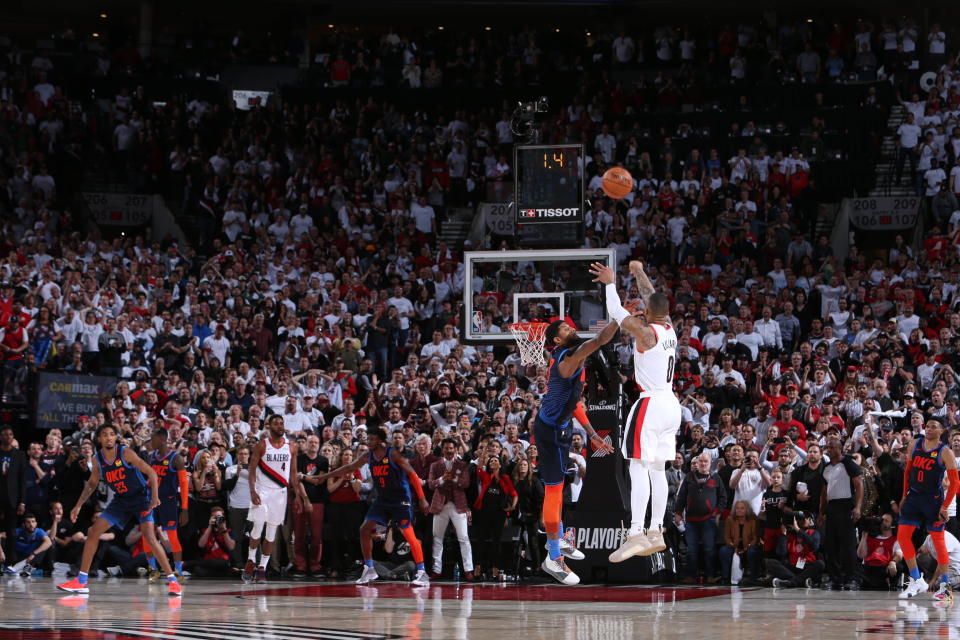 PORTLAND, OR - APRIL 23: Damian Lillard #0 of the Portland Trail Blazers shoots the three-point shot to win the game against the Oklahoma City Thunder during Game Five of Round One of the 2019 NBA Playoffs on April 23, 2019 at the Moda Center in Portland, Oregon. NOTE TO USER: User expressly acknowledges and agrees that, by downloading and or using this Photograph, user is consenting to the terms and conditions of the Getty Images License Agreement. Mandatory Copyright Notice: Copyright 2019 NBAE (Photo by Sam Forencich/NBAE via Getty Images)