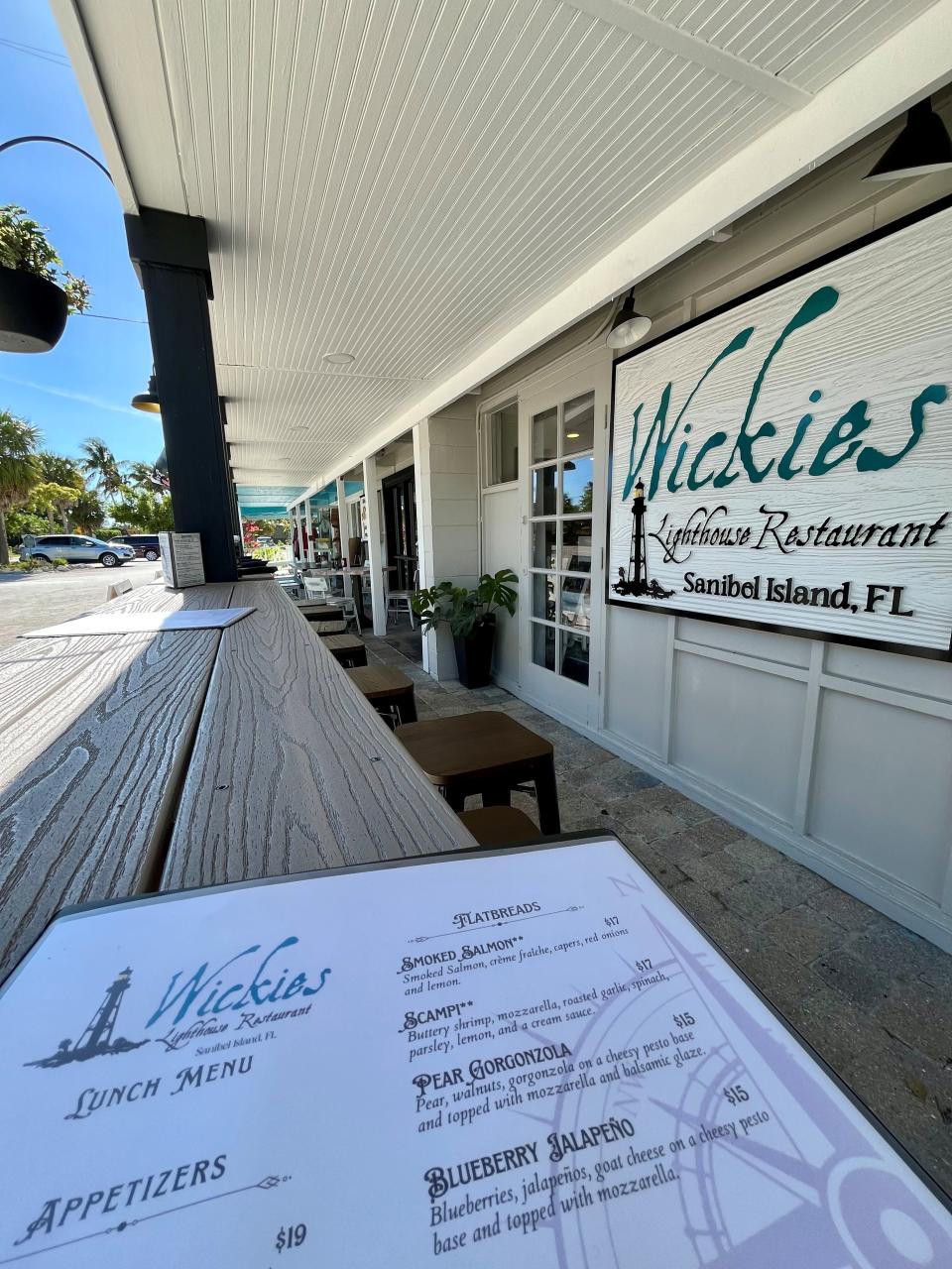 Have drinks along the outdoor rail at Wickies Lighthouse on Sanibel.