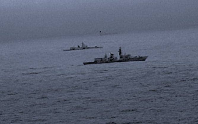 HMS St Albans (foreground) and the Russian Admiral Gorshkov (background) in the early hours of Christmas Day - This image may be used for current news purposes only. It may not be used, reproduced or transmitted for any other purpose.