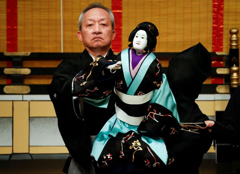 Kanjuro Kiritake, a Bunraku puppeteer, performs Japan's traditional puppet drama called 'Bunraku' at National Theatre in Tokyo