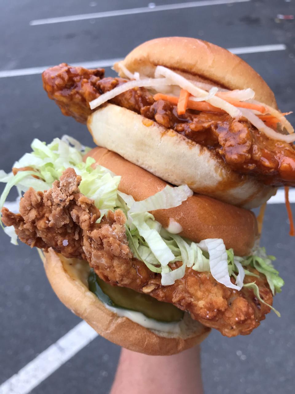 At Hoagitos in Belmar, the Forbidden Chicken sandwich (top) has sweet and spicy glaze and carrot-daikon slaw, and the Finger Licker has honey butter, pickles and garlic mayo.