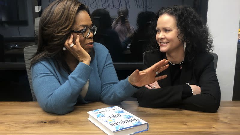 Oprah Winfrey, left, and “American Dirt” author Jeanine Cummins appear in a conference room just above Modern Studios in Tucson, Ariz., where they taped an “Oprah’s Book Club” show about Cummins’ controversial book.