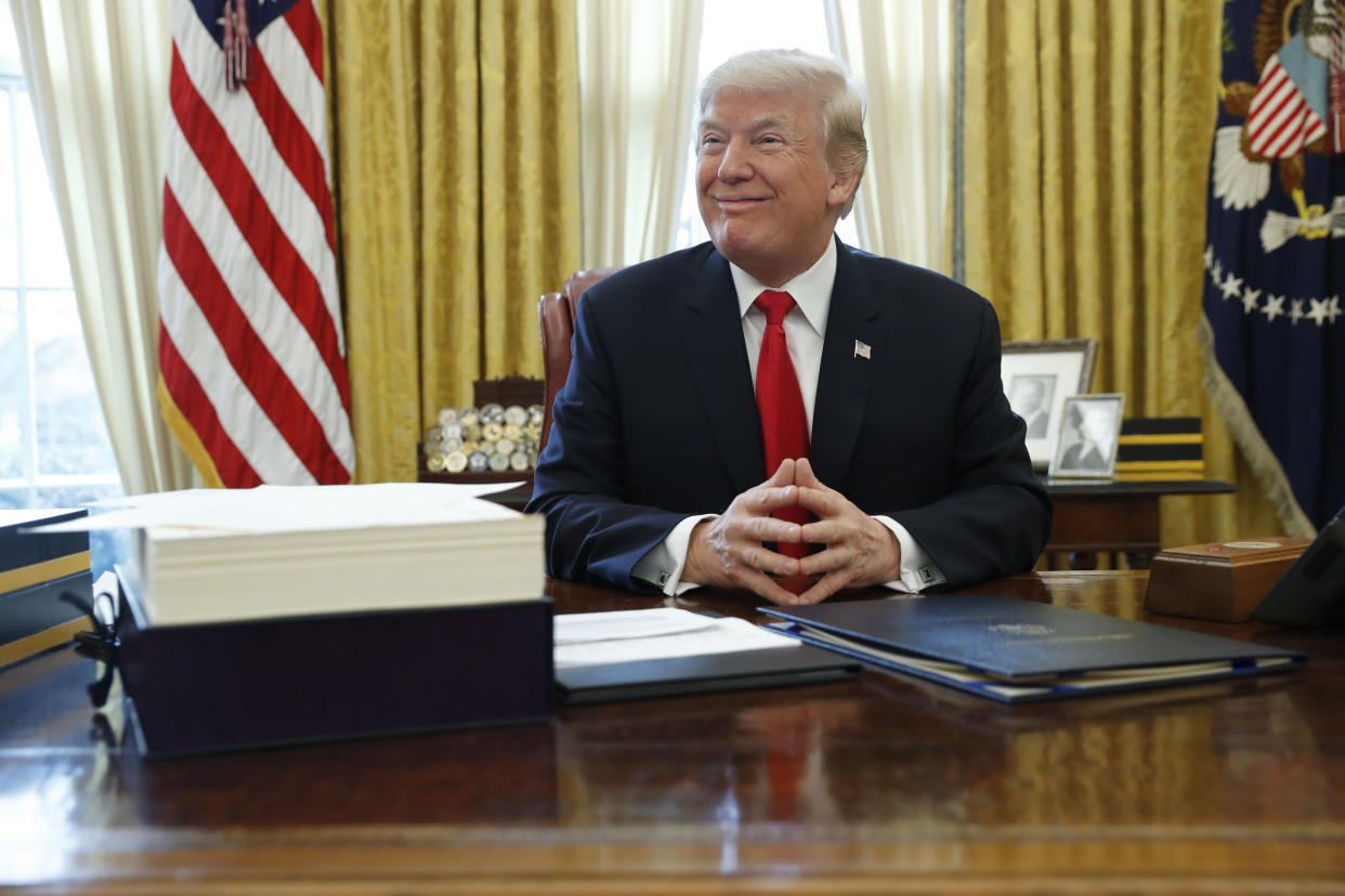 President Donald Trump reportedly rips documents, which then have to be taped back together by White House staff. (Photo: Jonathan Ernst / Reuters)