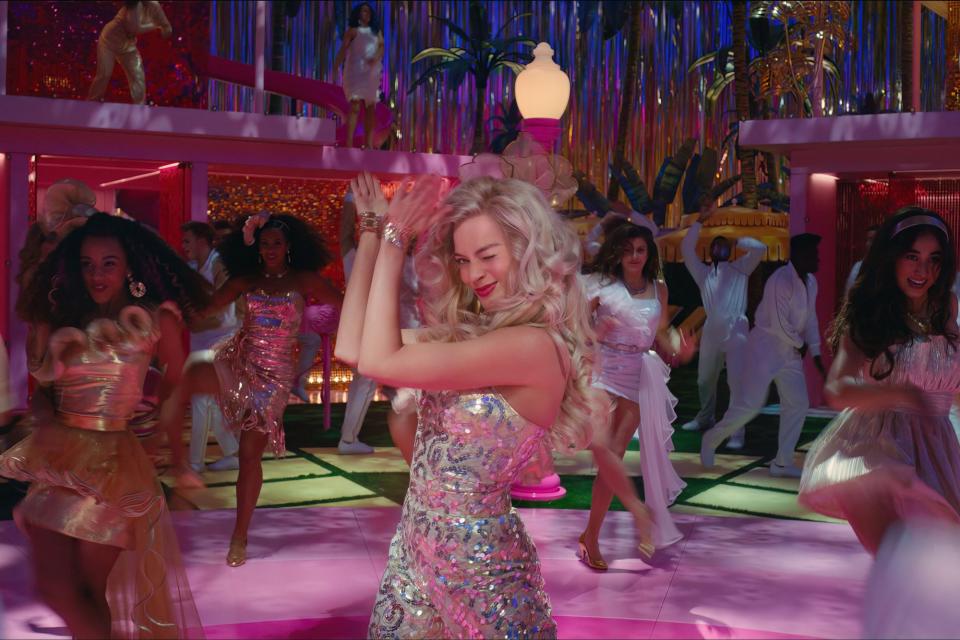 <p>Barbie is a dancing queen in the disco-inspired jumpsuit she wears in the trailer. </p>
