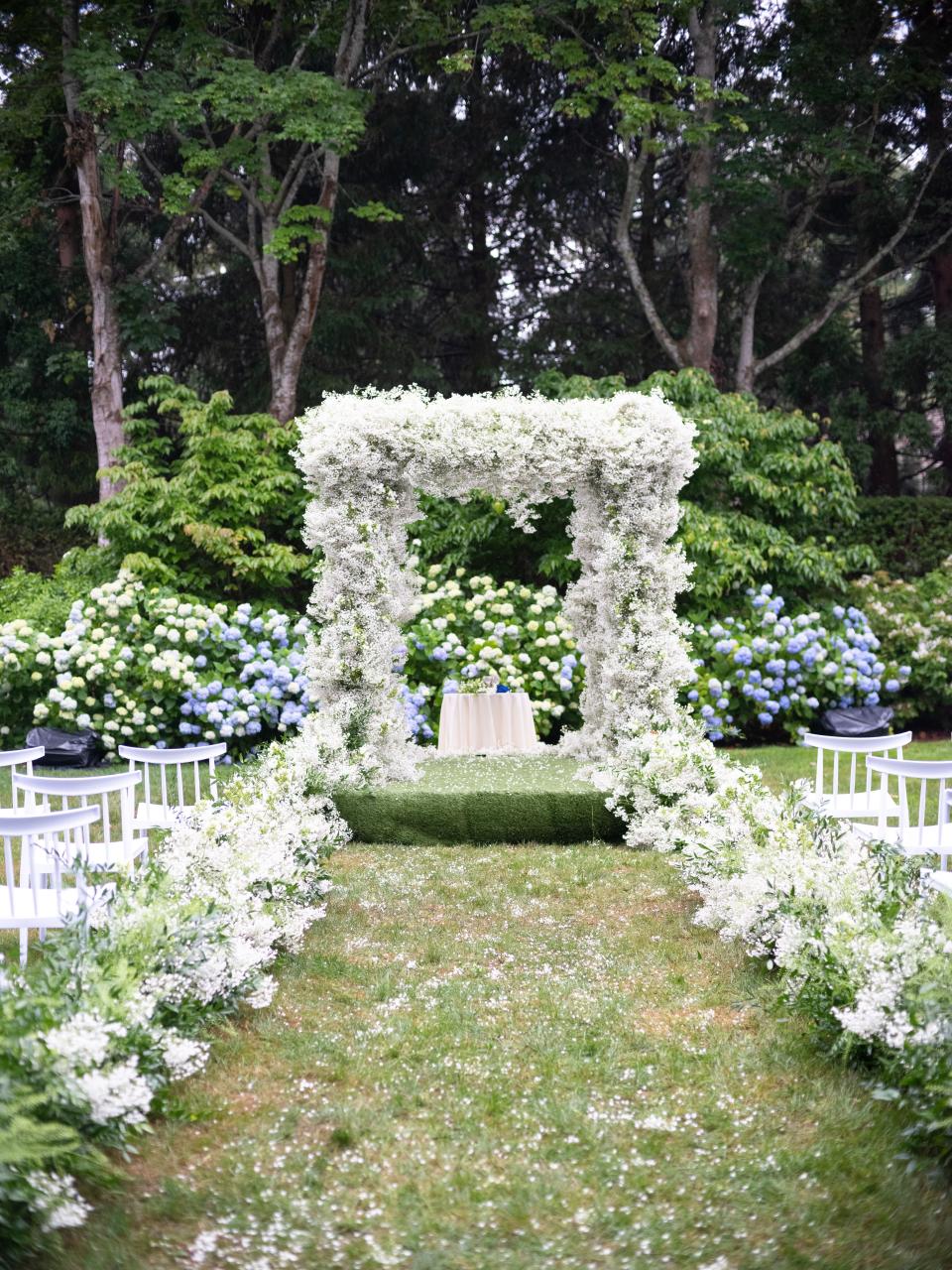 The Bride and Groom Said Their Vows Beneath a Floral Chuppah at This Hamptons Backyard Wedding