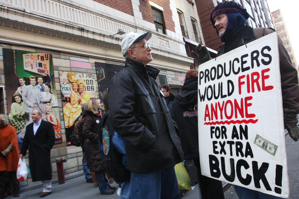 FILE - This Nov. 24, 2007 file photo shows John Joseph Kelly, a stagehand for "Hairspray" at the Neil Simon Theatre, right, speaking with Mark Zimmerman, president of Actors' Equity, as Kelly pickets outside the theater in New York. The Actors' Equity Association, which has begun a yearlong celebration of its centennial, will get a Special Tony in recognition of their work negotiating wages, working conditions and benefits for stage performers and crew members. (AP Photo/Tina Fineberg, file)