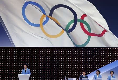 China's Vice President of State Council and Head of the Beijing 2022 delegation Liu Yandong (L) speaks during 2022 Winter Games presentation at the 128th International Olympic Committee (IOC) Session in Kuala Lumpur, Malaysia, July 31, 2015. REUTERS/OLIVIA HARRIS