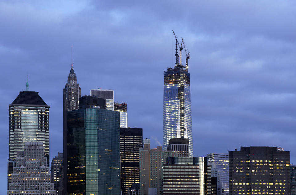 Weather postpones trade center's ascent to tallest