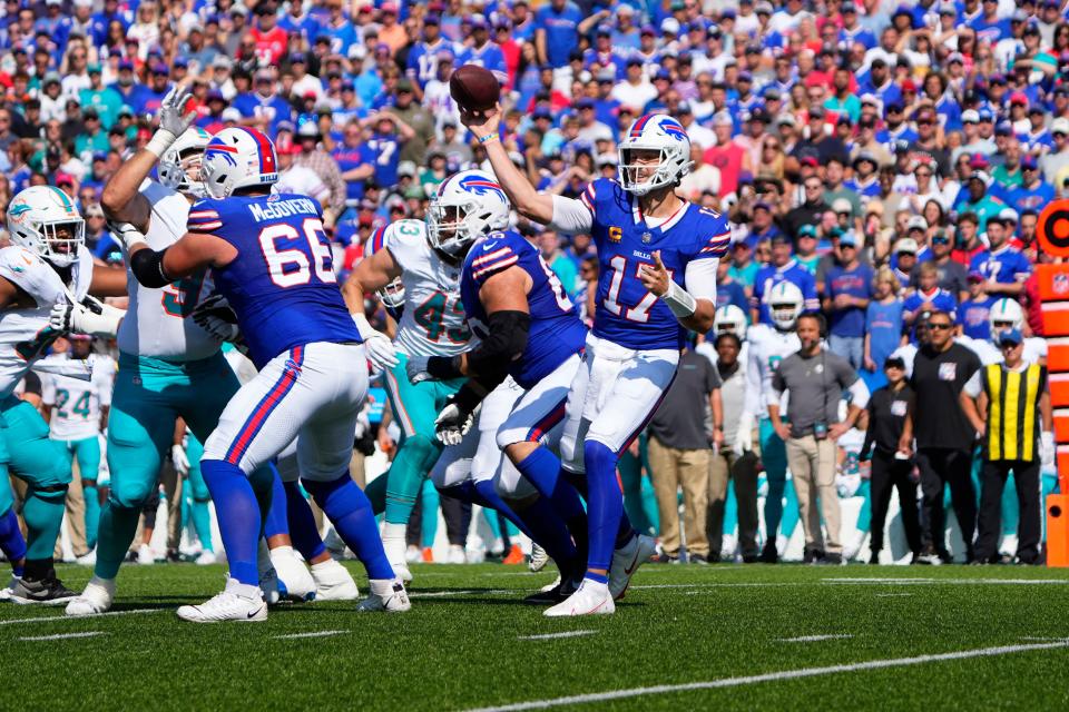 Buffalo Bills quarterback Josh Allen (17) throws the ball against the Miami Dolphins during the first half at Highmark Stadium in Buffalo.